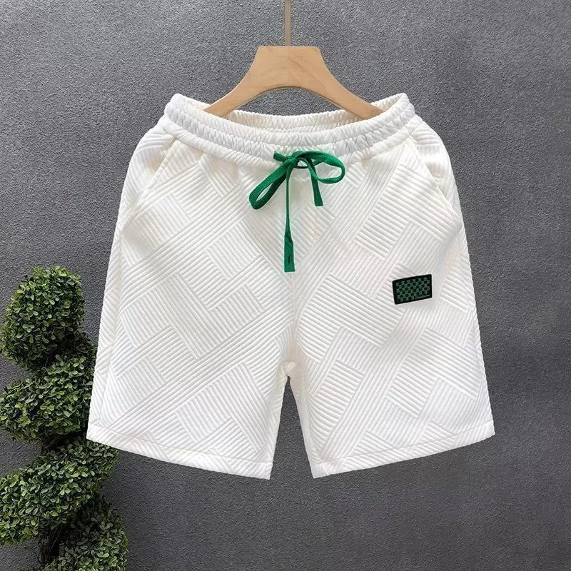 Men's casual sports shorts in white, black, or green with micro-elastic polyester fabric