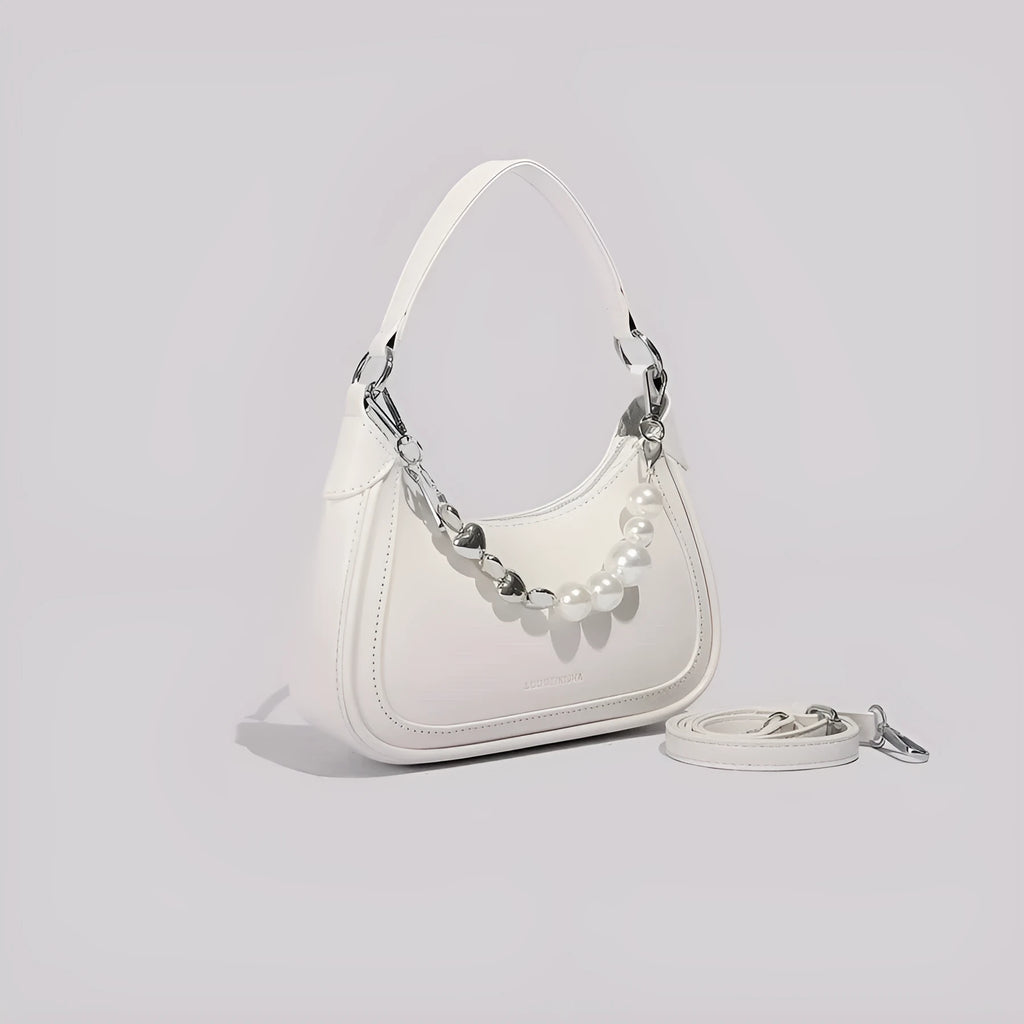 White PU crossbody shoulder bag with vertical square shape, three-dimensional outer pocket, and phone compartment.