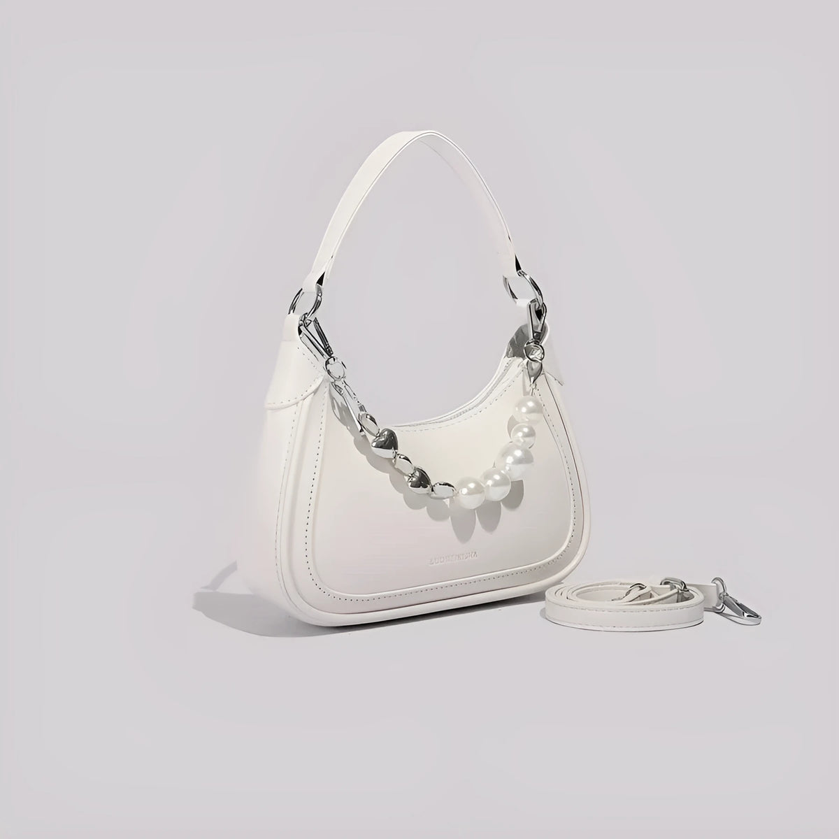 White PU crossbody shoulder bag with vertical square shape, three-dimensional outer pocket, and phone compartment.