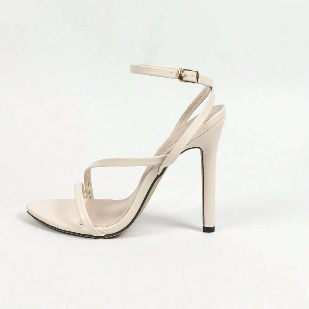 Women's gold high heels with round toe, open toe design, and multi-stripe cross ankle straps