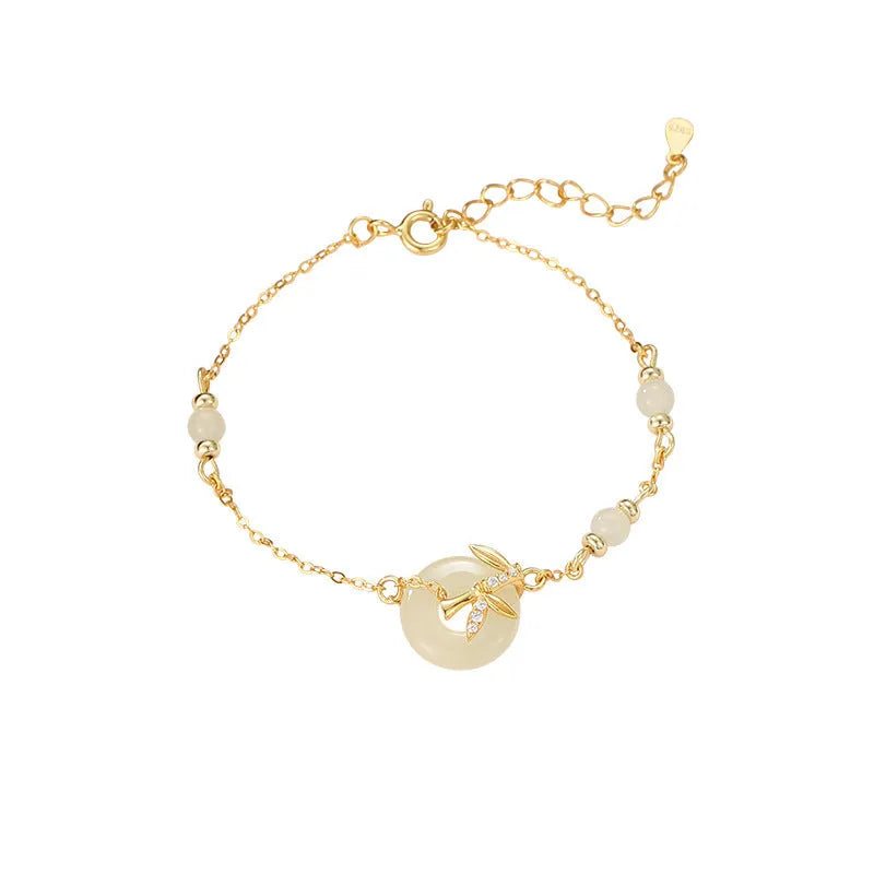 Women's antique style silver bracelet with a peace buckle and safety clasp in gold or silver finish.
