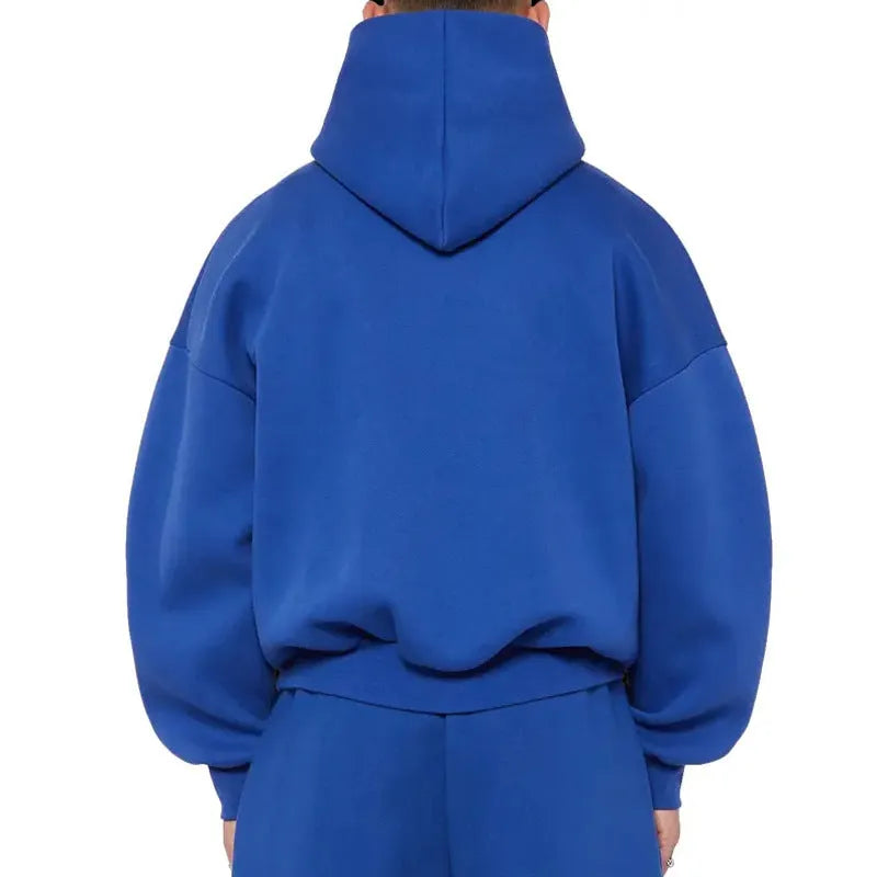 A man's grey fleece-lined pullover sweatshirt with long sleeves, shown on a hanger.