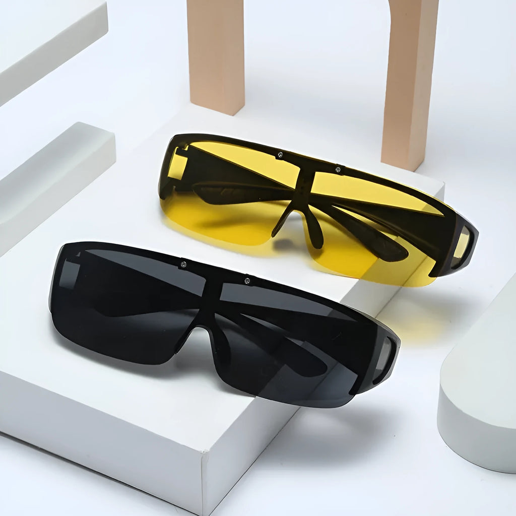 Pair of polarised myopia sunglasses with a one-piece frame, shown with dark lenses for outdoor sports use.
