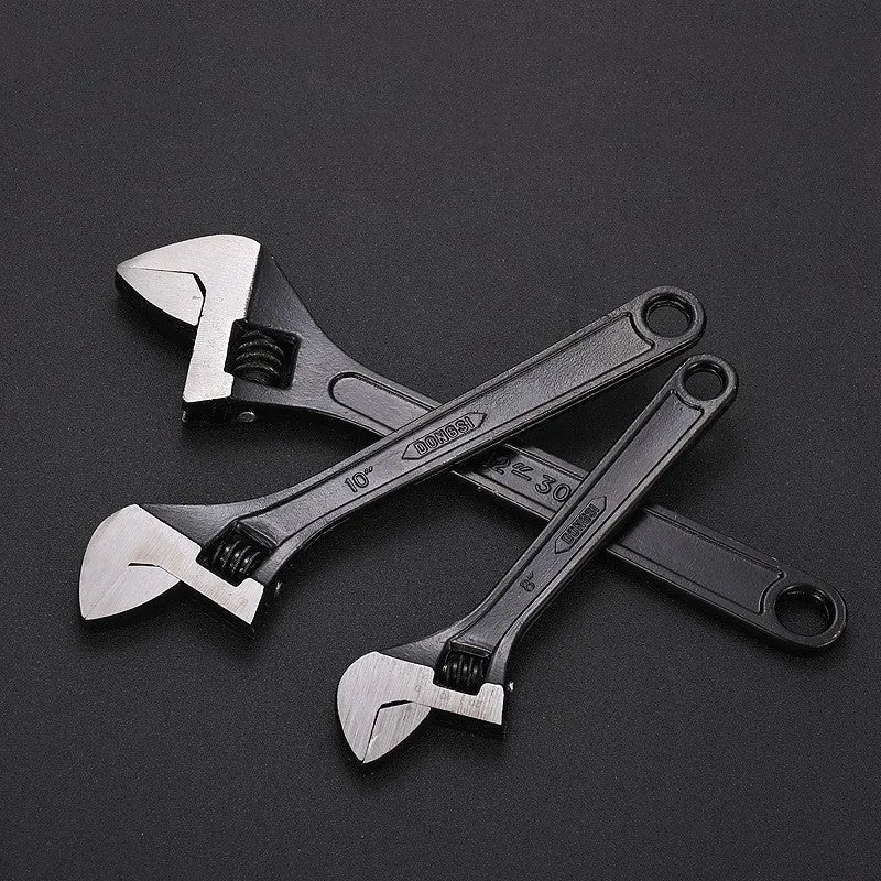 Blackened high carbon steel adjustable open-end wrench showing adjustable jaw mechanism and ergonomic handle