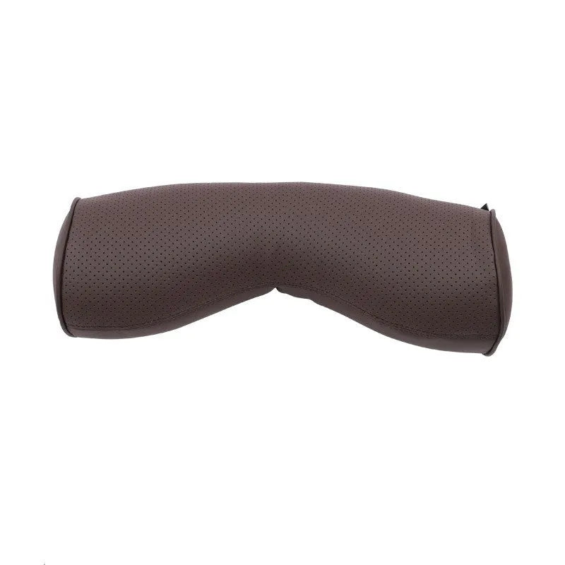 Minimalist brown car headrest with integrated neck pillow and lumbar support cushion.