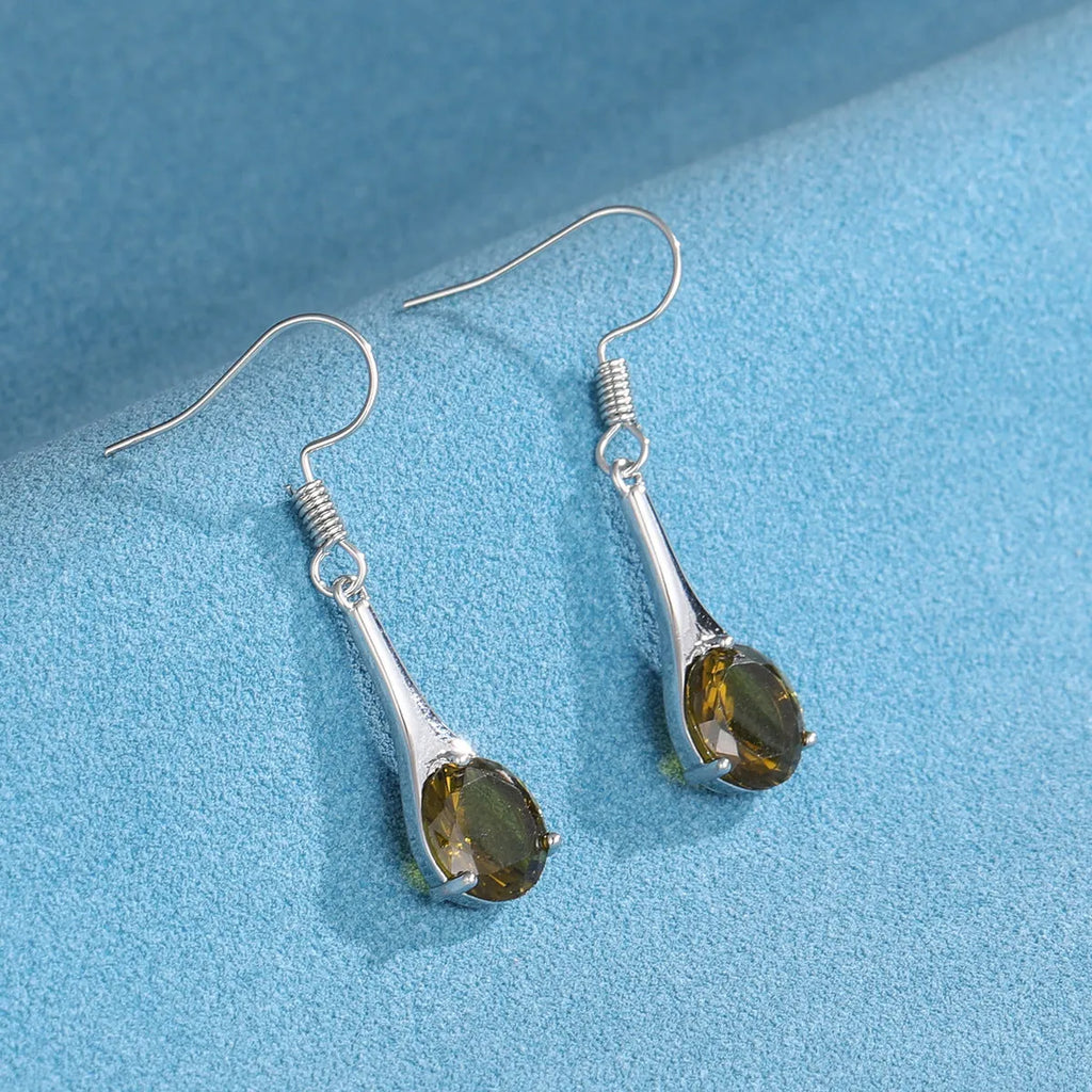 Olive green topaz drop earrings with minimalist water drop shape and retro style