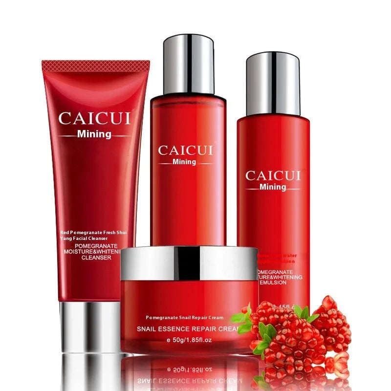 Red pomegranate skincare set showing four bottles: face wash, toner, lotion, and facial cream.