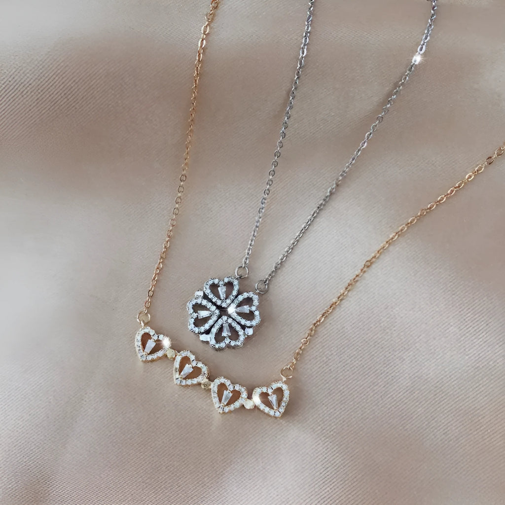 Silver detachable four leaf clover necklace in titanium steel with zircon stones and magnetic folding heart pendant