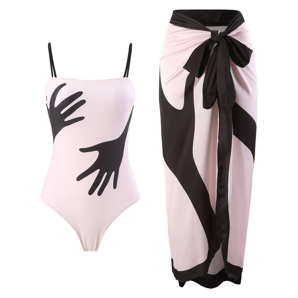 Women's one-piece bikini swimsuit with an attached white tulle skirt, shown on a mannequin.