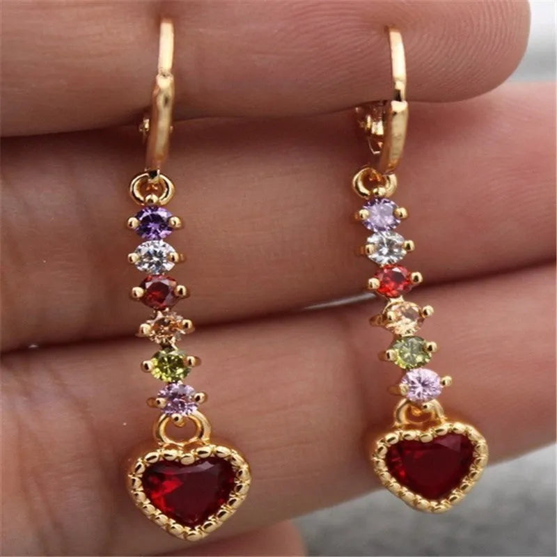 Women's heart-shaped fashion earrings with gold or silver electroplated alloy construction