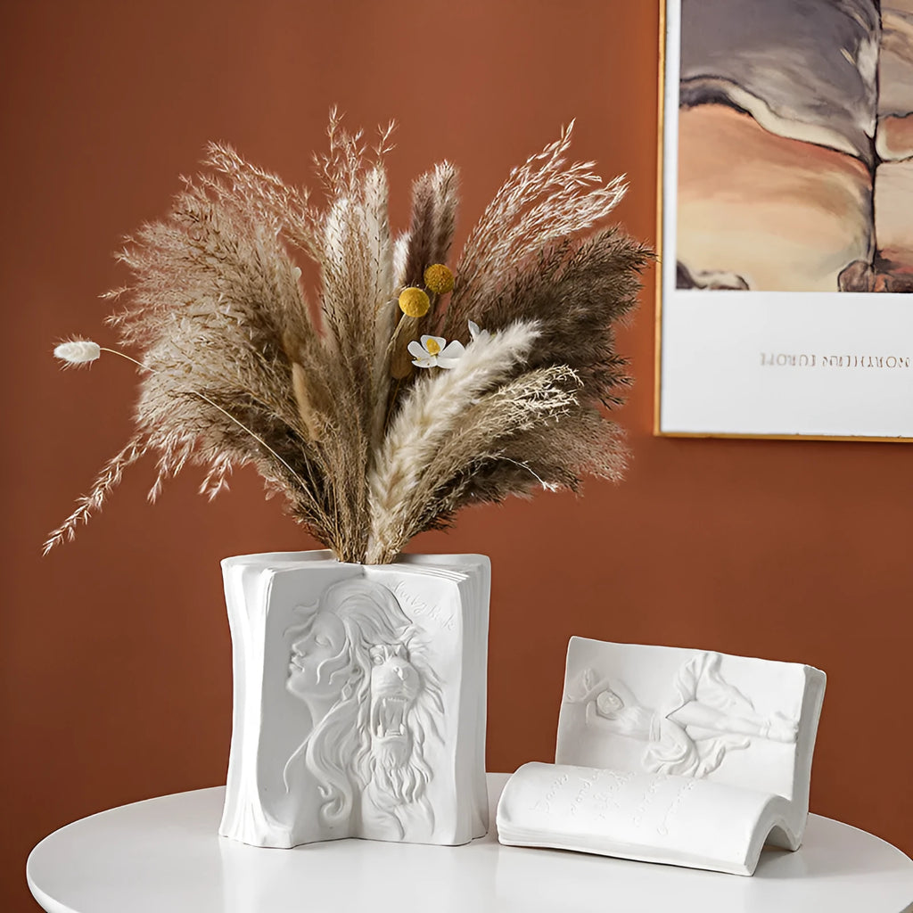 Ceramic book stand with glazed surface in one of four artistic designs: lover, dancer, beauty and beast, or brushed face