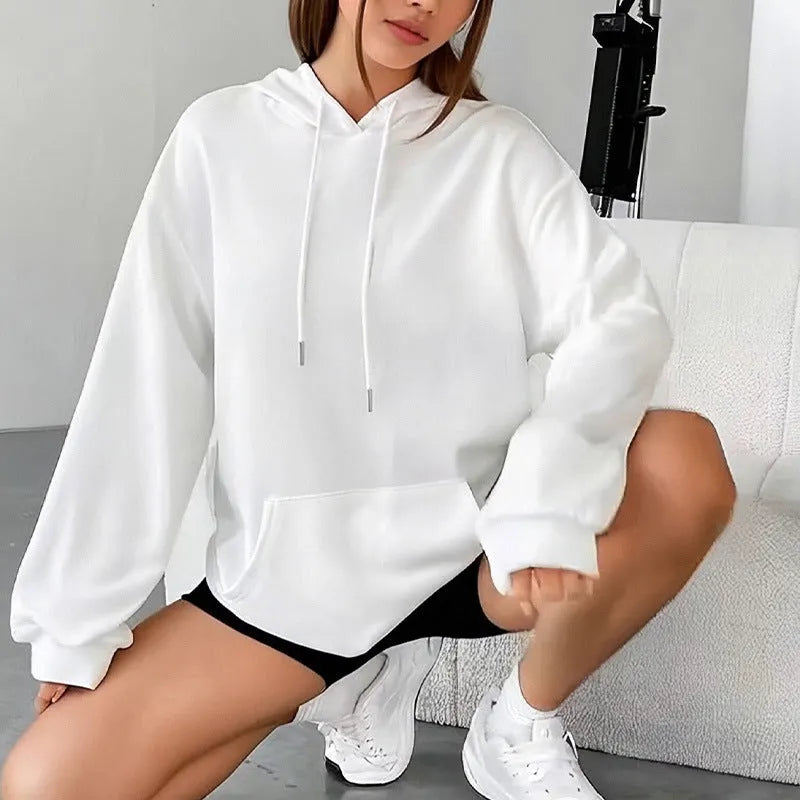 Women's loose grey drawstring hoodie with front pockets on a hanger.