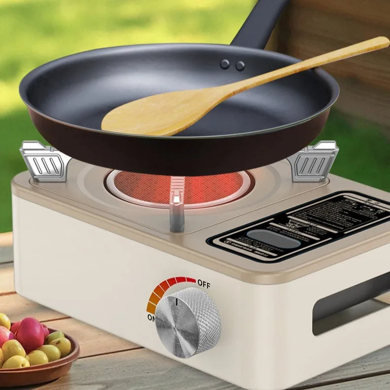 White stainless steel portable infrared gas stove for outdoor camping and picnics.