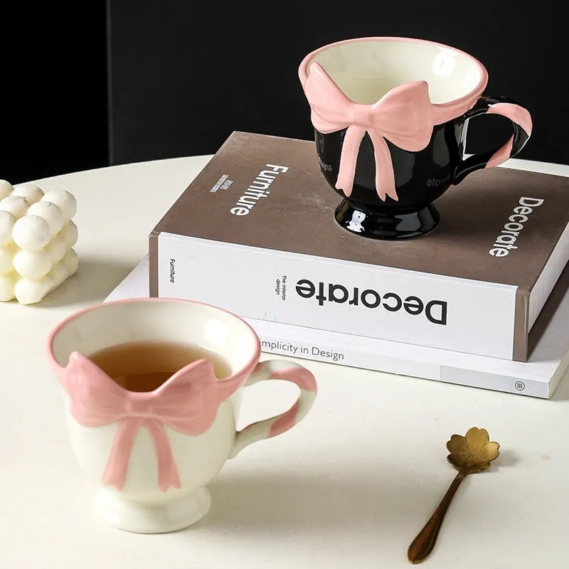 Ceramic heart bow mug with handle in white powder or black pink colour, 330ml capacity