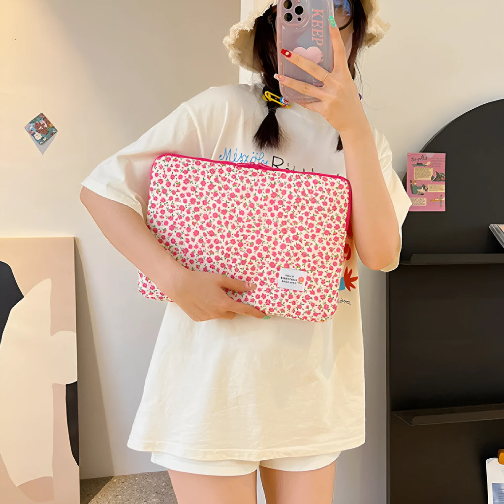 Women's floral print cloth laptop bag shown in green flower pattern, with anti-seismic feature.