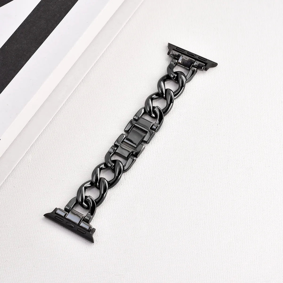 Silver metal chain link Apple Watch strap with 22mm lugs on a watch case
