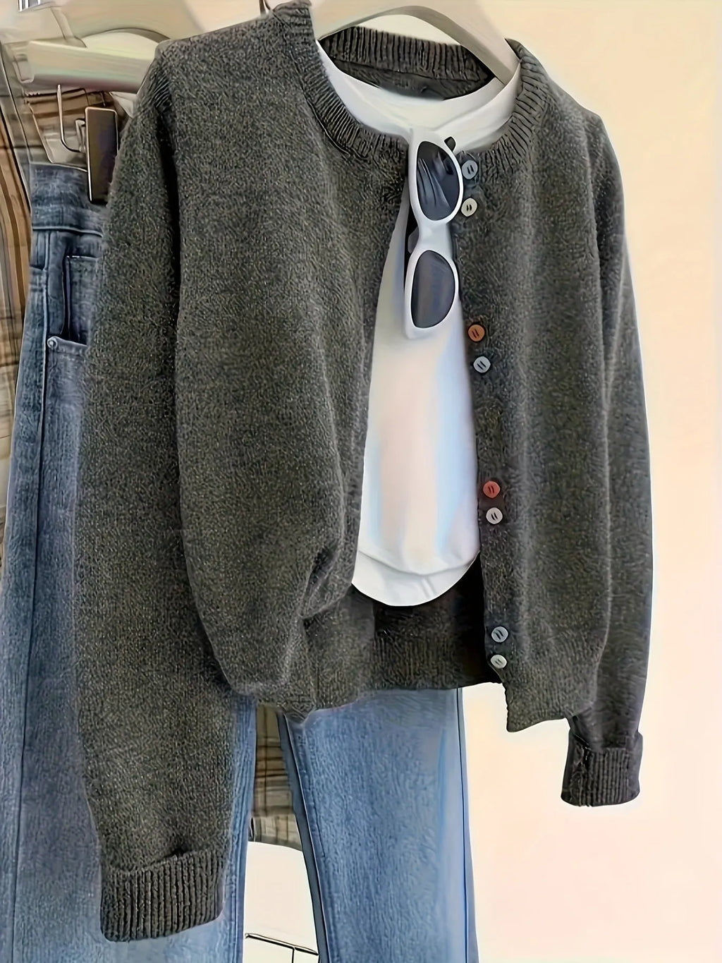 Dark grey women's polyester cardigan with long sleeves and button front.
