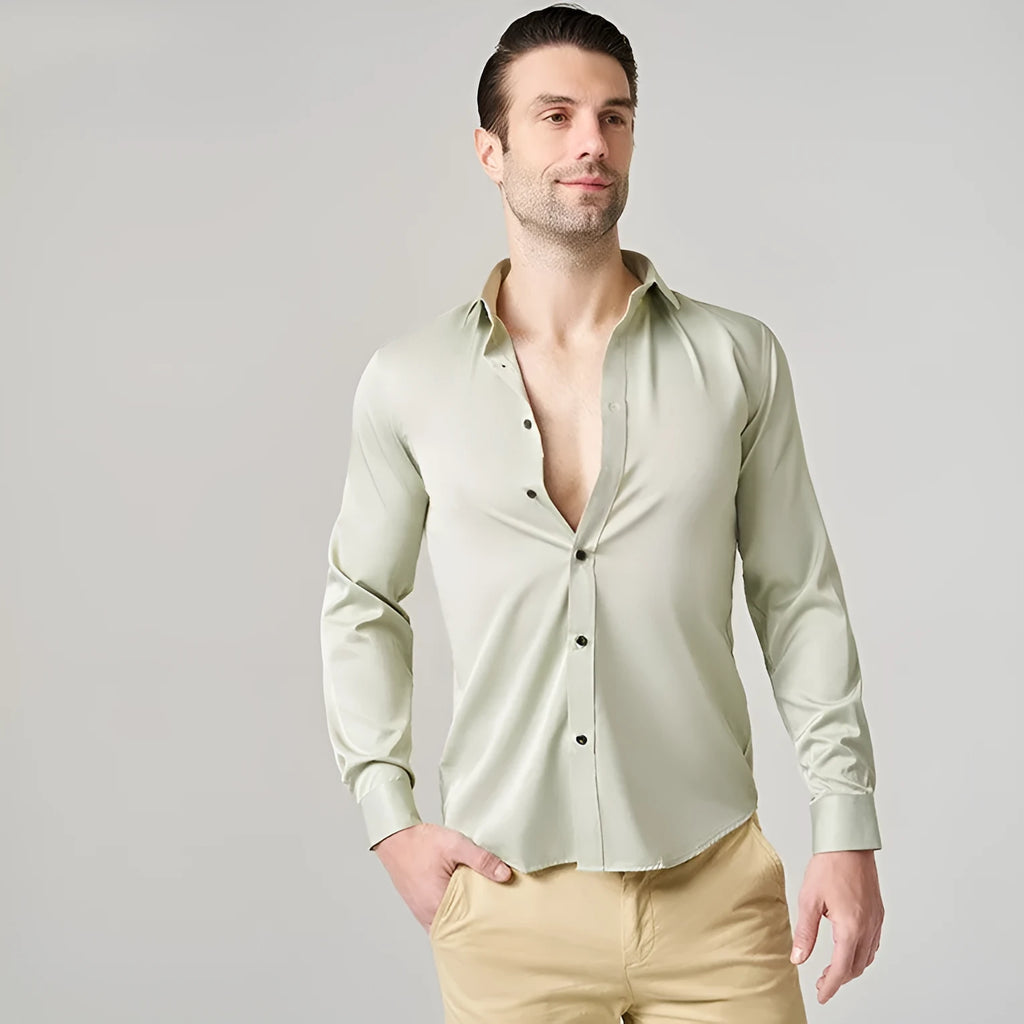 Man wearing a stretch long sleeve work shirt in a solid colour, showing the fit and style.