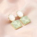 Contrast colour water ripple geometric square earrings in light blue, electroplated alloy, side view