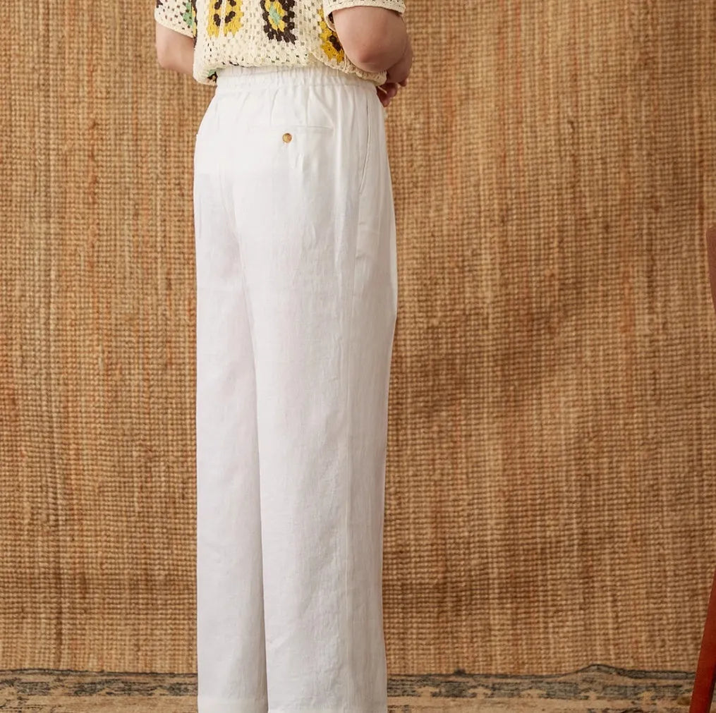 Linen straight-leg trousers with a high elasticated waistband in greige colour.