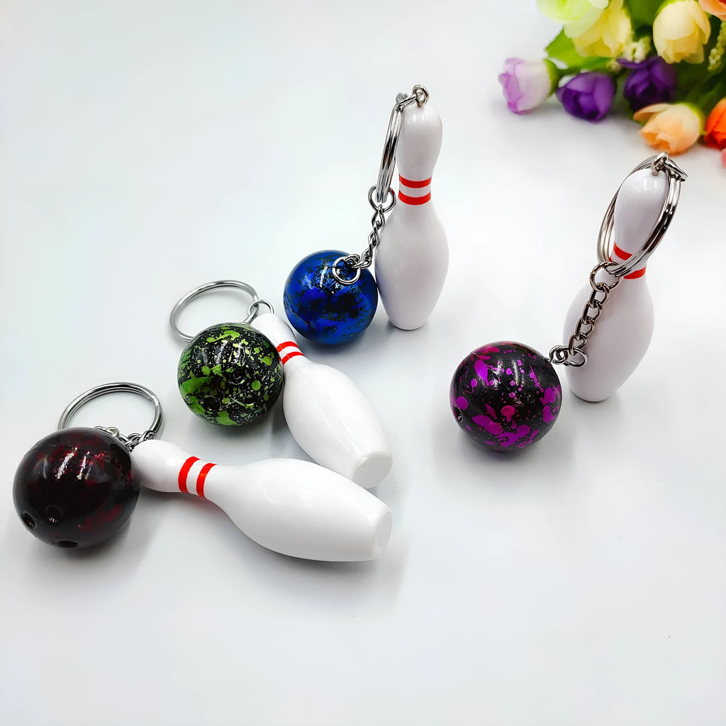 Mini simulation bowling ball keychain pendant with metal clip in blue, red, purple, and green colours