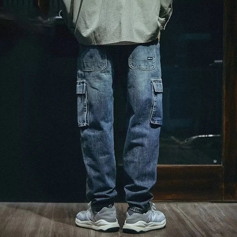 Blue men's loose fit straight leg stretch denim jeans with a zip fly closure.