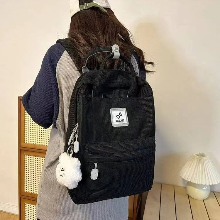 Retro hand-carrying backpack for junior high school with document bag, computer pocket, and sewing-line detail