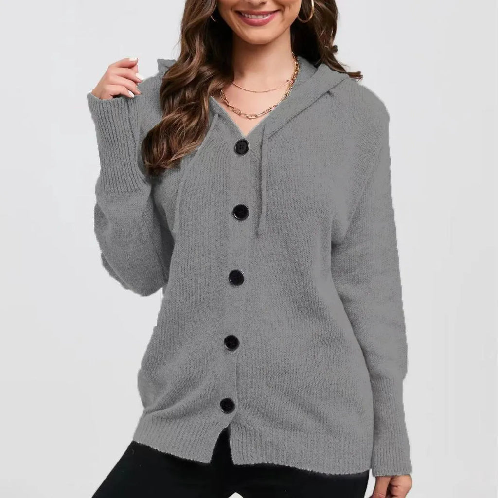 Women's solid colour hooded cardigan sweater in a loose fit, shown in one of six available colours.