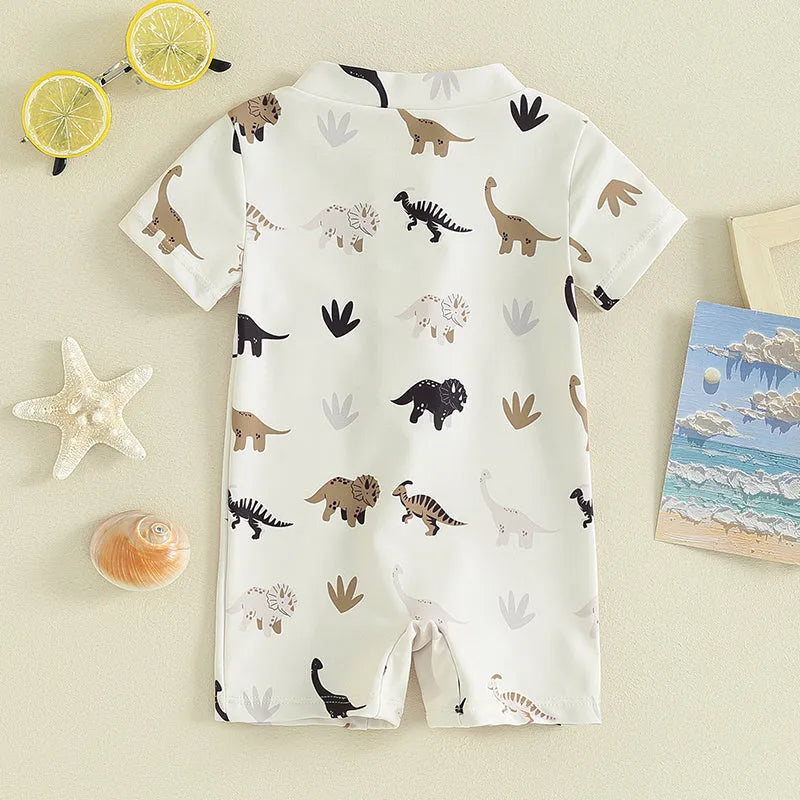 Children's polyester swimsuit in peacock green white coconut tree print and ivory white black coffee dinosaur print, sizes 70-110