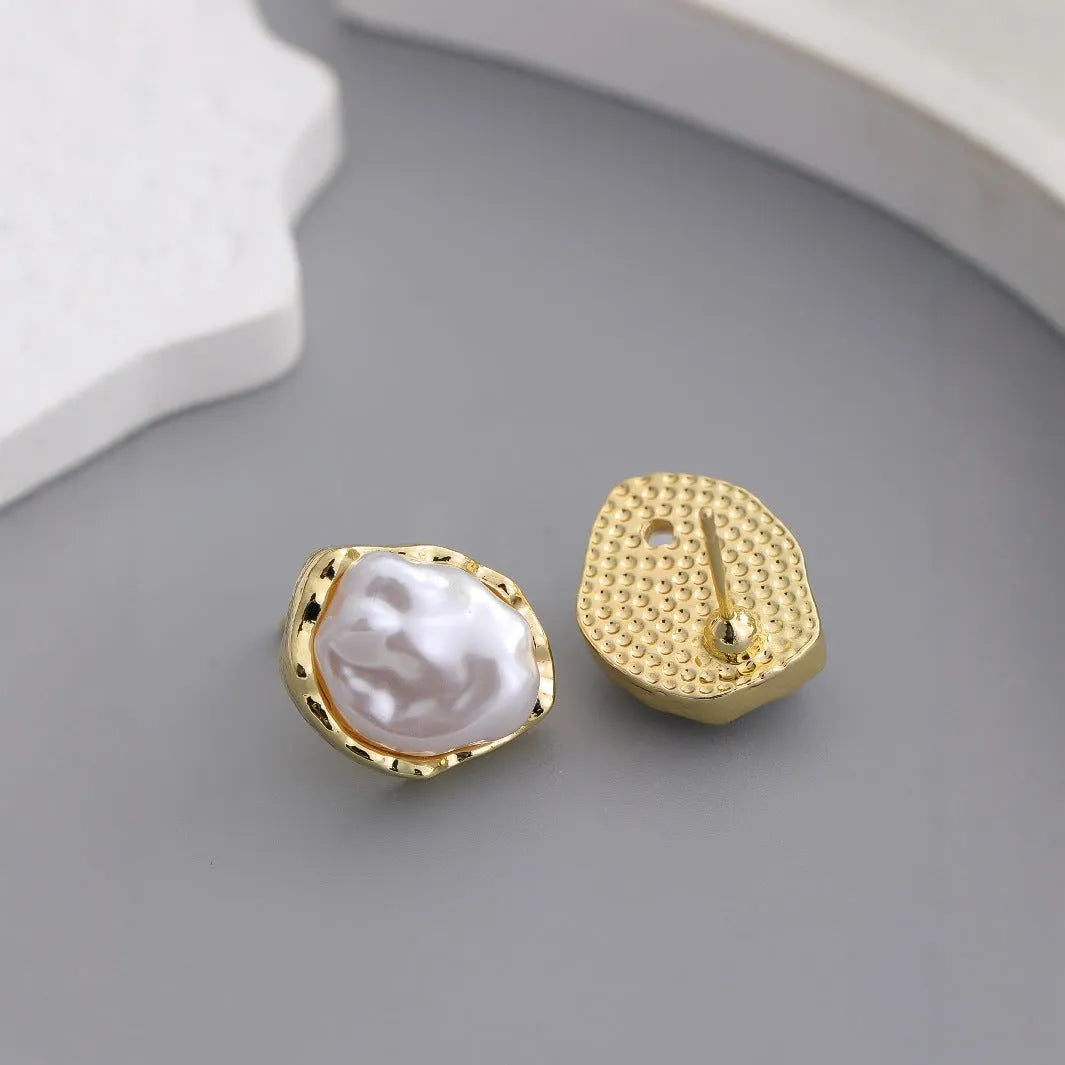 Irregular freshwater pearl drop earrings with gold-toned alloy metal findings in white and gold