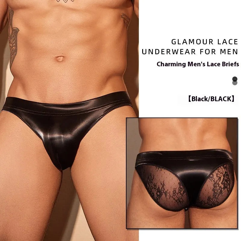 Men's black shark skin lace briefs with small hip cut on a white background.