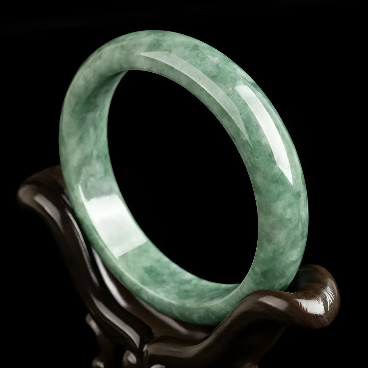 Natural emerald bean green beaded bracelet for women on a gift box.