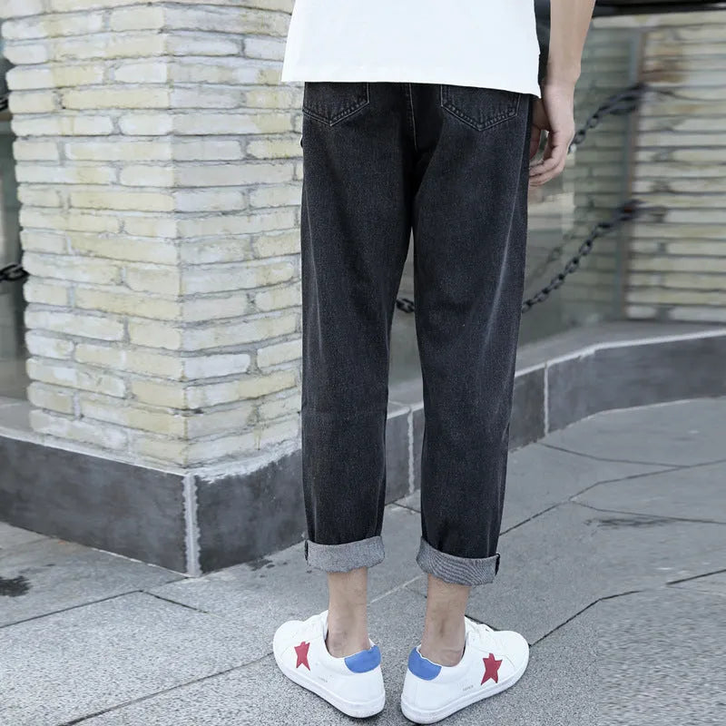 Men's loose straight leg jeans in black and blue colours showing straight cut and light straight leg opening