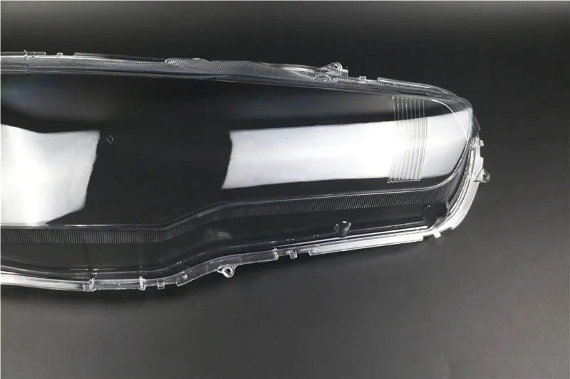 Transparent plastic headlight housing cover measuring 50x30x20mm for vehicle lamp replacement