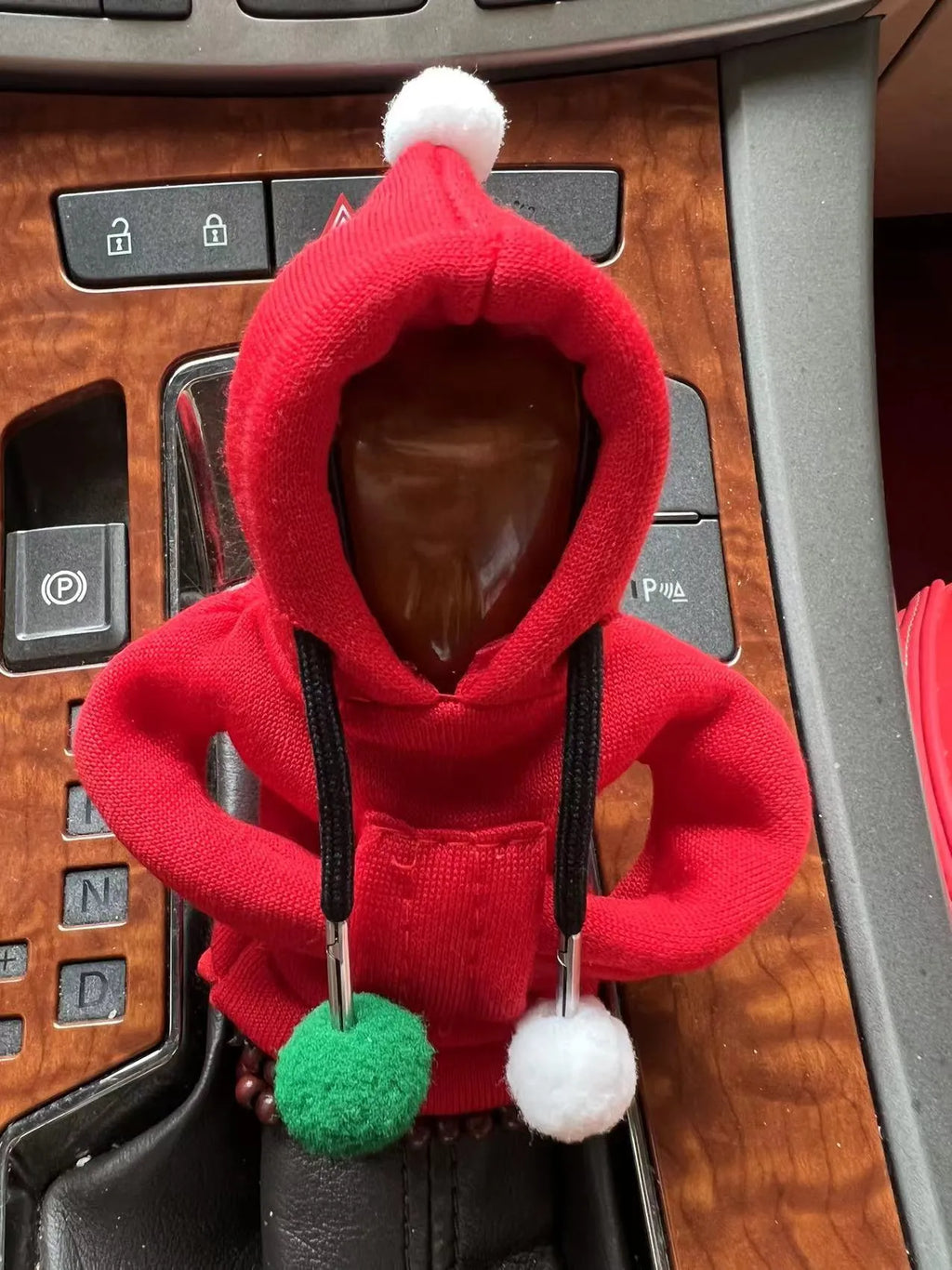 Santa Claus car gear lever cover in black or pink fabric with hooded sweatshirt design, fitting gear shift knob and handbrake.