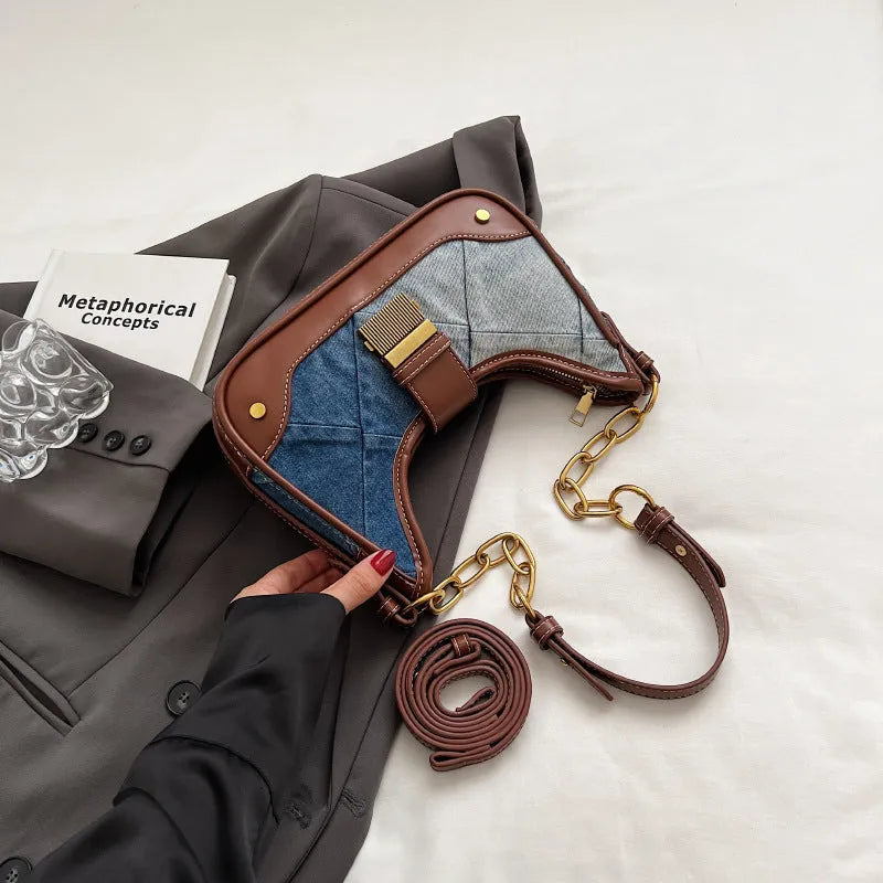Brown soft denim women's bucket shoulder bag with diamond mesh and chain strap.
