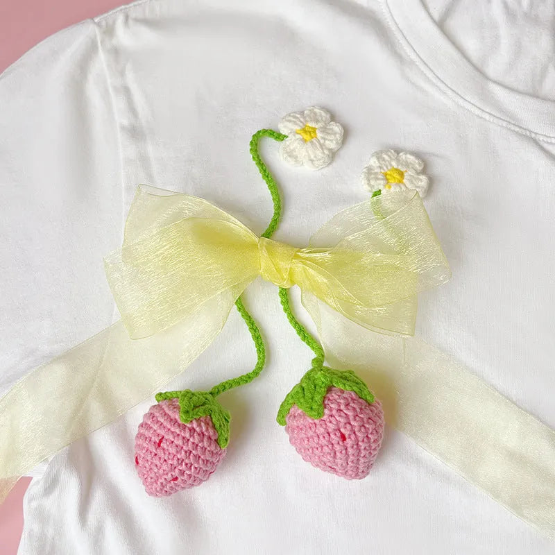 Wool crochet woven strawberry pendant with 35cm cord in pink or red colour options
