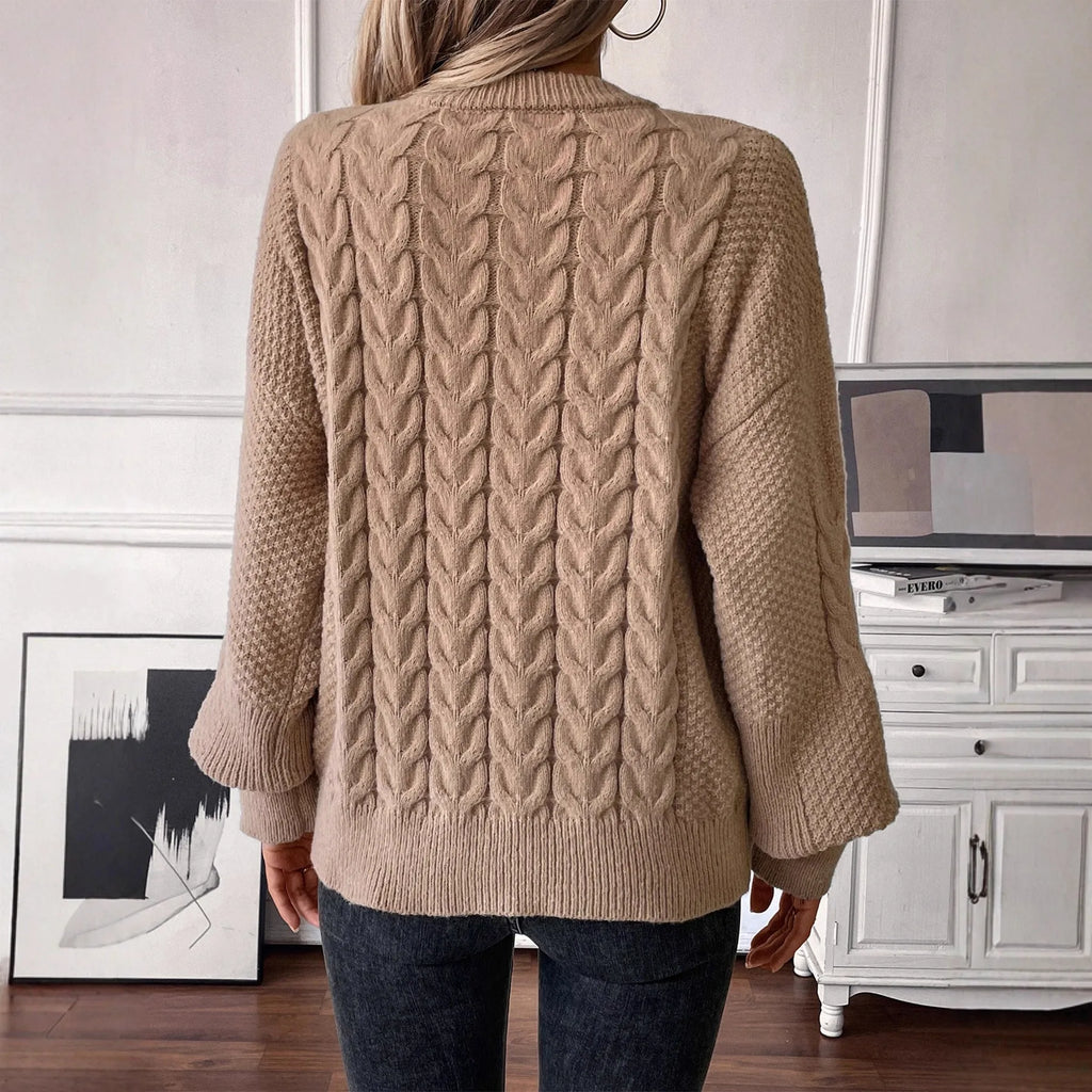 Women's beige polyester pullover sweater with round neck and twist design detail