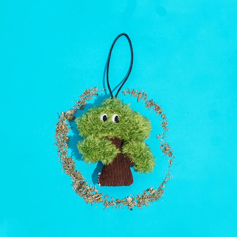 Felt pine tree shaped cat toy with cotton rope hanger and cat mint scent.