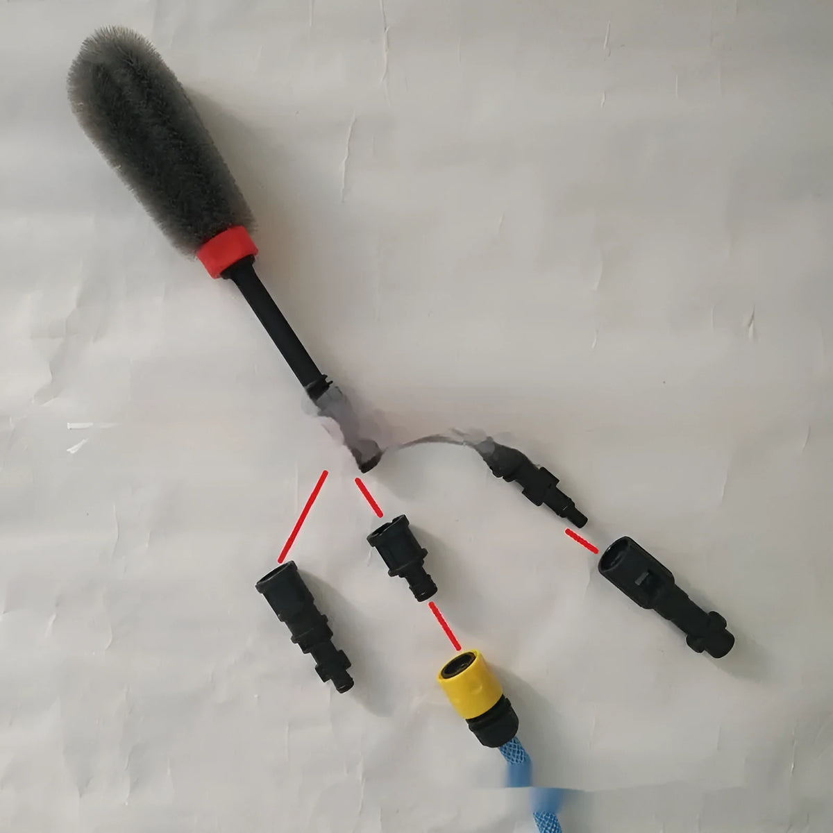 Quick plug high-pressure car wash wheel hub brush with flow-through design, steel wire and PA6 construction