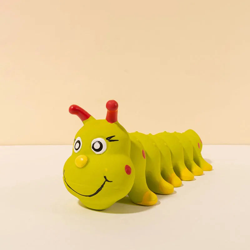 Yellow rubber caterpillar-shaped dog squeaky chew toy on a white background