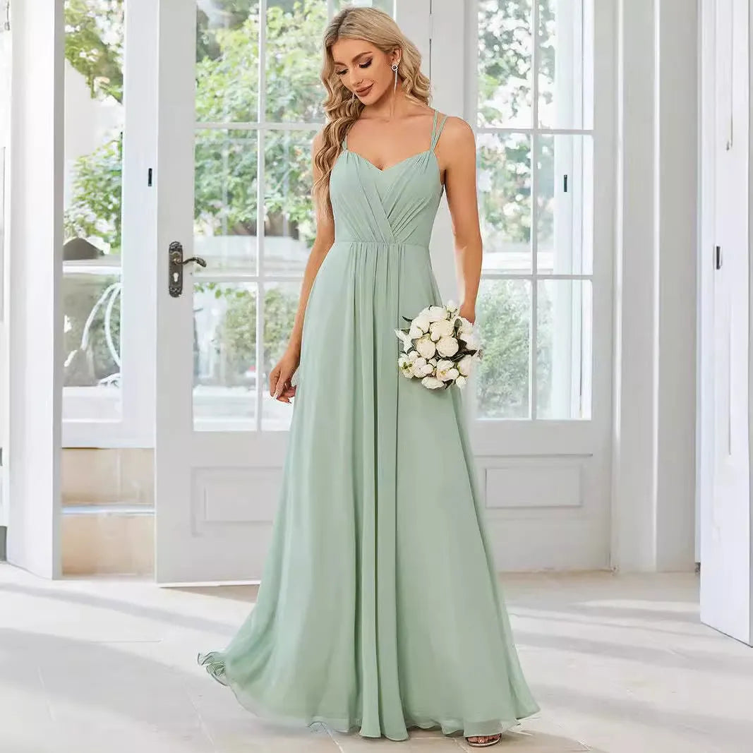 Women's sleeveless A-line pleated dress with sling neckline in light green colour