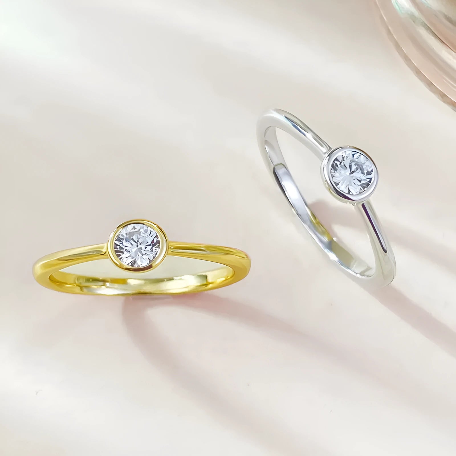 Minimalist crown-shaped silver ring with linear design in electroplated gold or platinum finish.