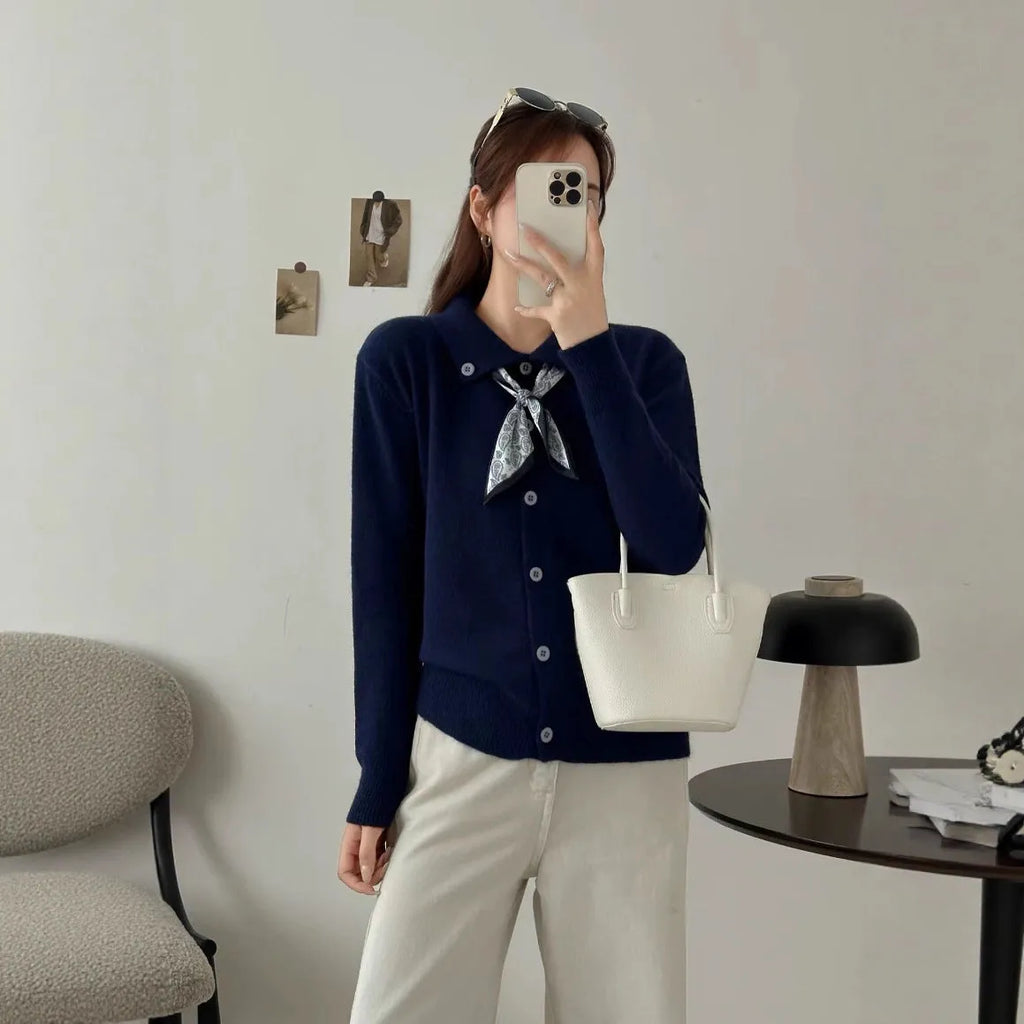 Lapel scarf cardigan sweater in acrylic, shown in milky white, grey, black, and navy blue colour options.