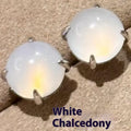 A pair of Chinese-style retro stud earrings with a round egg-shaped chalcedony stone in a four-claw copper setting.