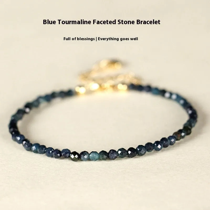 Close-up of a blue tourmaline and spacer bead bracelet for women.