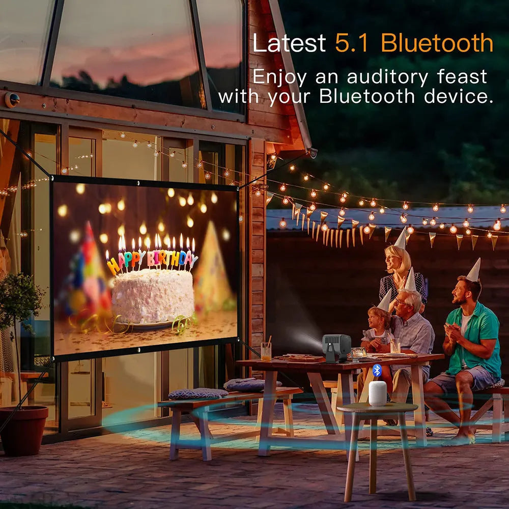 Black portable smart projector with Android system, remote control, and power cables