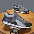 Men's grey and green low-top mesh running shoes with lace-up front.