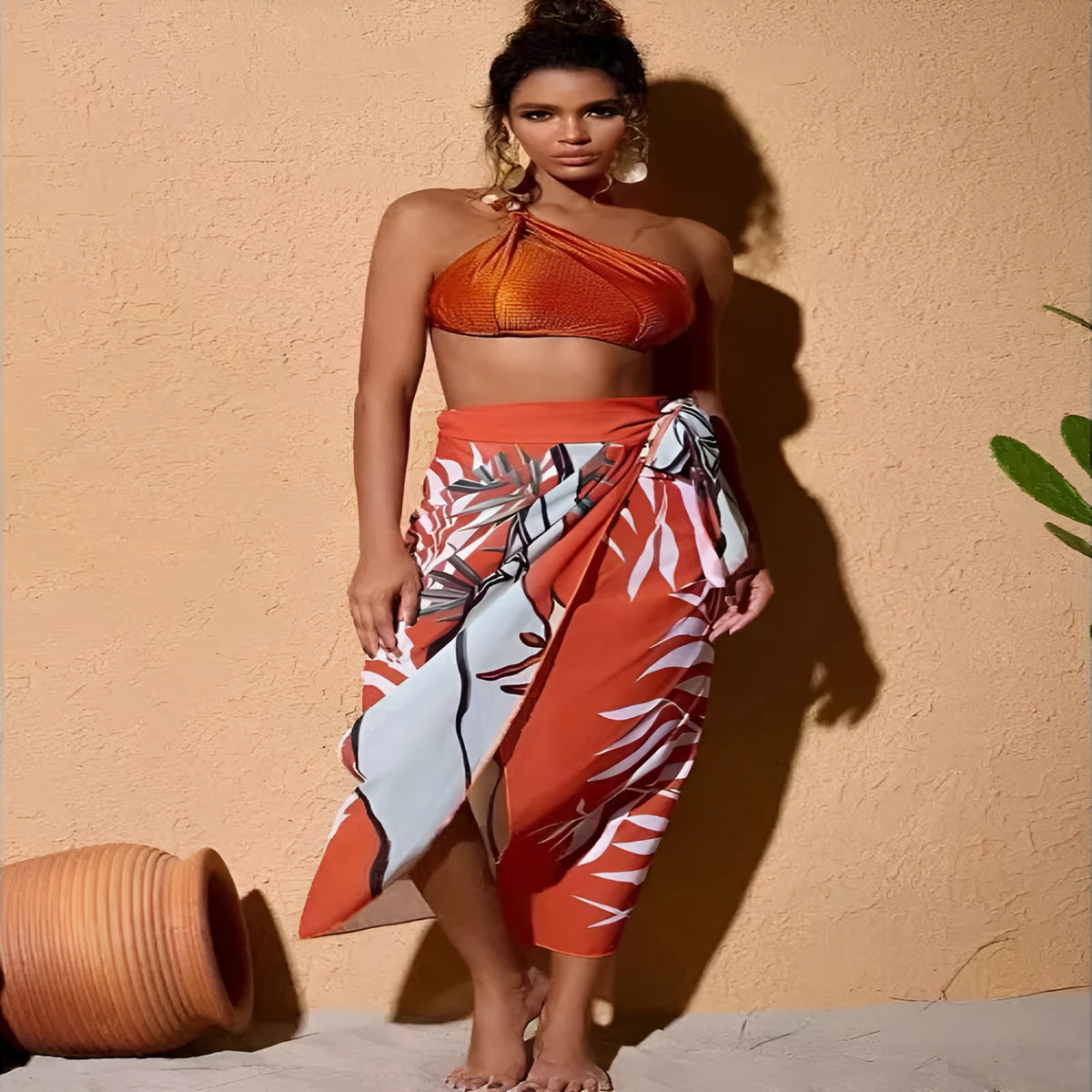 Women's brown push up bikini with high waist briefs and a matching sheer chiffon dress overlay.