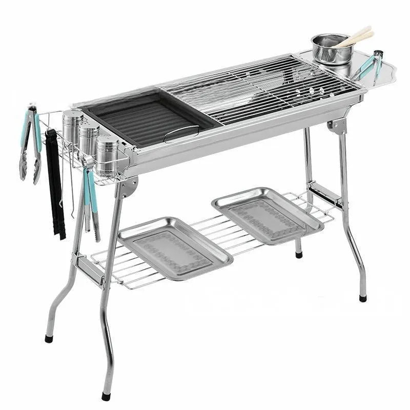 Portable stainless steel charcoal barbecue oven with integrated furnace and cooking accessories